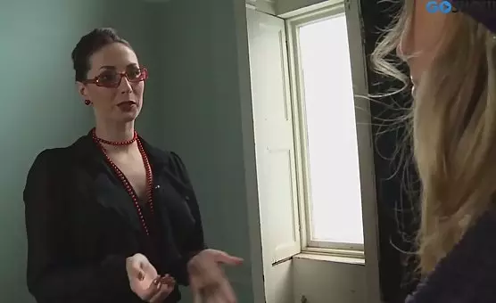 The sophisticated businesswoman exposes her charms beneath her skirt